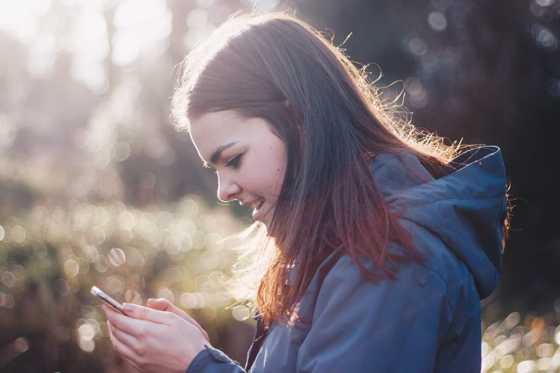 celine-using-phone